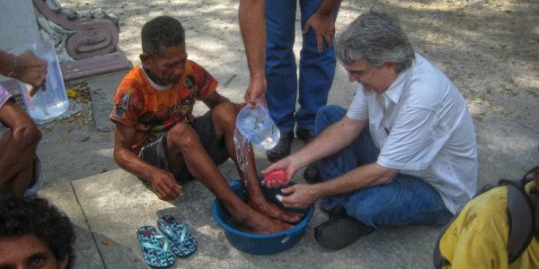 Getting ready to wash Saulo's feet